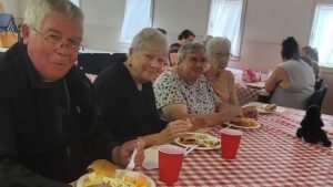 Folks enjoying their meal at St. Pauls